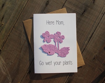 Here Mom, Go wet your plants- Violets shaped seed paper