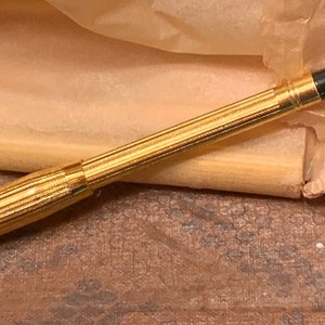 1 stubby 4 1/2 stubby cigarette holders Regular size, Spring ejector