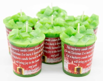 May include: Six green votive candles with a red and gold label that reads "This bayberry candle comes from a friend. So on Christmas Eve burn it down to the socket. For a bayberry candle burned to the socket will bring joy to the heart and gold to the pocket."