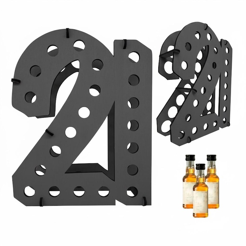 May include: A matte black, three-dimensional number 21 display stand featuring multiple circular cutouts along the surface of the digits. The structure is designed to hold small bottles, with three miniature glass bottles shown nearby.