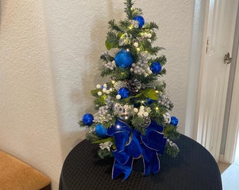 Blue Lighted Christmas Tree, Artificial Holiday Decor,  Pre- Lit Pre-Decorated Pinecone, Holly, LED Timer Lights. 24"  or 18”