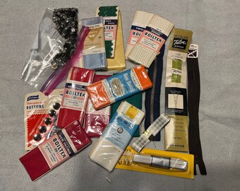 Large Lot of Sewing Notions Including Facing, Piping, Zippers and Snaps