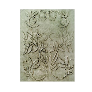 May include: A rectangular, textured, light gray decorative panel with an embossed botanical design. The design features symmetrical leafy branches and curling vines, creating a natural, elegant aesthetic. The panel is suitable for wall decor.