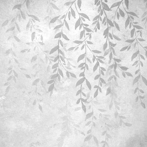 May include: A grayscale image featuring a textured background with a watercolor-style design of hanging branches and leaves. The leaves are a lighter shade of gray, creating a subtle contrast against the background.