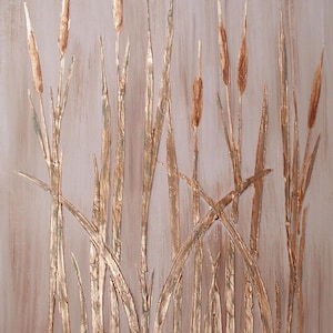 May include: Textured abstract painting featuring stylized cattails in shades of gold and brown against a neutral background. The artwork has a three-dimensional effect, with raised elements creating depth and visual interest. The overall theme is nature and landscape.