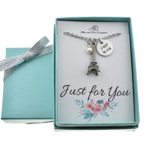 Eiffel Tower necklace in silver pewter and c&#39;est la vie charm in stainless steel, accented by a wire wrapped pearl or crystal birthstone.