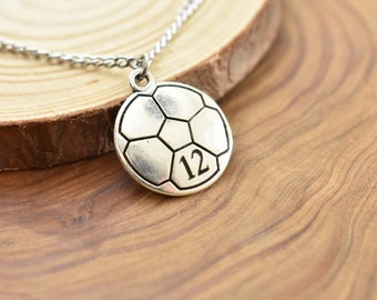 Laser Engraved Soccer charm pendant in silver tone metal on a stainless steel curb chain. Boy's necklace. Soccer player gift.
