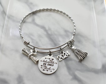 Graduation Stainless Steel Bangle Bracelet and 2024 Graduate Charms. 2024 Graduation. Class of 2024. She believed she could so she did.