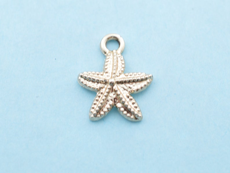 Ocean Water I must go/' word tag with gold toned starfish pendants on a stainless steel chain Woman/'s necklace /'the sea is calling.. Sun.