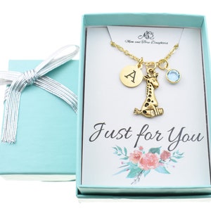 Little girl&#39;s personalized giraffe necklace in 24K gold plated pewter with initial and birthstone on a stainless steel cable chain Giraffe.