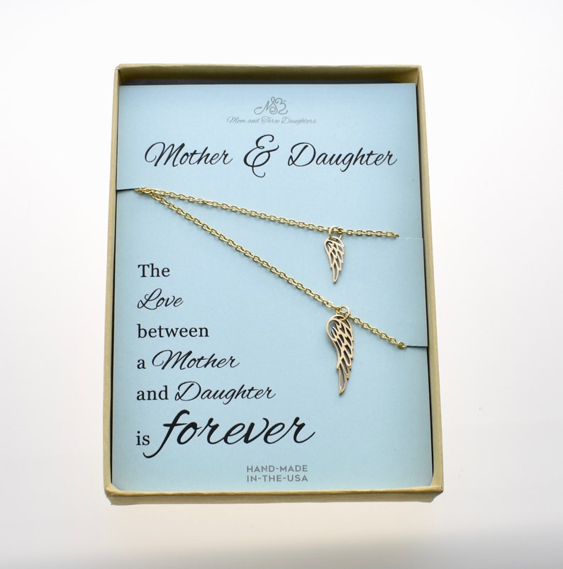 Angel wing charms Angel wing necklaces Mother Daughter angel wing charms. Angel wing necklace set