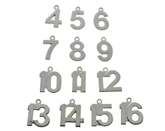 May include: A collection of silver-colored number charms, ranging from 4 to 16. Each charm has a small loop at the top for attaching to a necklace or bracelet. The numbers are in a simple, clear font.