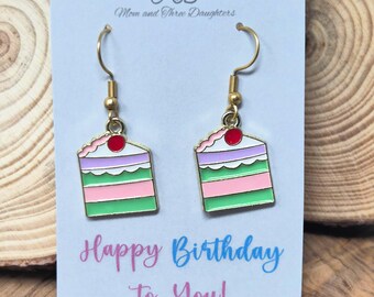Enamel cake slice charms suspended on gold plated stainless steel wires. Birthday Earrings.
