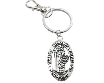 Saint Christopher Pendant Keychain in silver toned metal and stainless steel. St. Christopher keychain gift. Patron saint of travel gift.