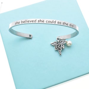Bachelor of Science in Nursing bracelet.  Gift for BSN.   Stainless steel bracelet:  "She Believed She Could And She Did with BSN Caduceus.