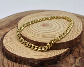 Men's gold 6mm curb bracelet in stainless steel.  Waterproof.  Men's jewelry.