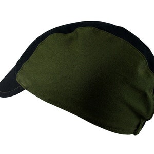 May include: A black and green baseball cap with a curved brim. The cap has a black front panel and a green crown.