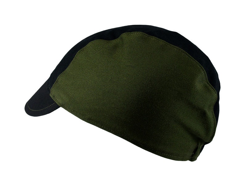 May include: A black and green baseball cap with a curved brim. The cap has a black front panel and a green crown.