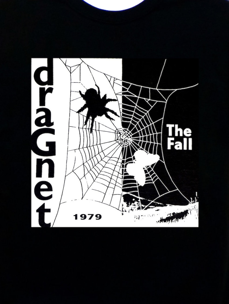 May include: Black and white graphic t-shirt with a spider web design and the text "dragnet" and "The Fall 1979".