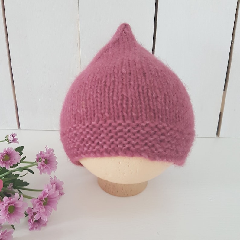 knitting pattern for a baby and child pointy gnome hat.