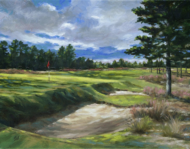 May include: A painting of a golf course with a green putting green, a red flag, and a sand trap. The green is surrounded by trees and bushes. The sky is cloudy and blue.
