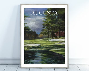 May include: A framed painting of a golf course with a green fairway, white sand bunkers, and a line of trees in the background. The sky is cloudy and the painting has the text "AUGUSTA Georgia" at the top.