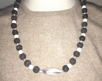 Chain of lava beads, white beads and silver colored metal beads, beads, pearl necklace, necklace