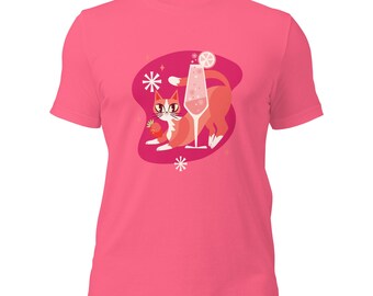 May include: Pink t-shirt with a graphic of a red cat with white paws and a glass of pink champagne with a lemon slice. The cat is holding a small red strawberry.