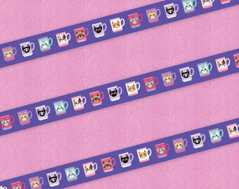 May include: A purple and blue patterned washi tape with a repeating design of colorful mugs with cat faces. The mugs are in various colors, including pink, red, orange, yellow, green, blue, and purple. The cat faces are also in various colors, including black, white, brown, and orange.