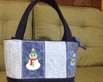 Embroidered purse with snowman