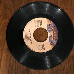 Donna Summer Vinyl 45 rpm Dim All The Lights free shipping in USA   (Box 2)