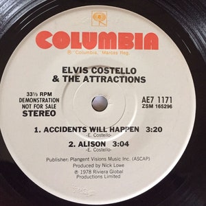Elvis Costello 3 song 7 inch EP   (195)