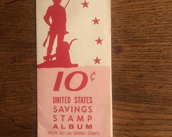 Album de timbres des États-Unis avec une économie de 10 cents avec quelques timbres (comme sur la photo)