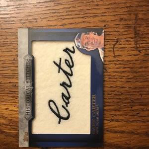 Cartão de beisebol com remendo de pontos históricos comemorativos de Gary Carter Topps (conforme foto) (1091)