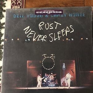 Neil Young LP Rust Never Sleeps with Lyric Sheet free shipping In USA  (B007)