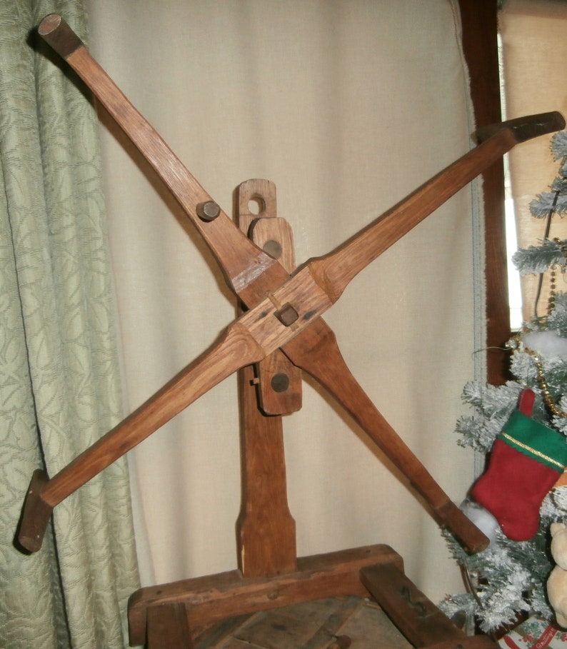 Antique hand made hand carved primitive wooden yarn winder spinner with wood pegs large 31 x 21 x 12 12 inches rustic built farm house