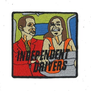 May include: Embroidered patch featuring a cartoon image of two people in a car with the text "Independent Drivers". The patch is on a green background with a blue and gray car interior.