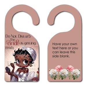 May include: A pink door hanger with a cartoon bride getting ready on one side and the text "Do Not Disturb The Bride is getting ready" and the other side has the text "Have your own text here or you can leave this side blank."