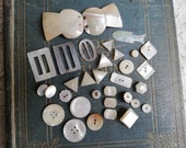 Antique mother of pear buttons, buckles, fish