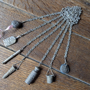 Original antique chatelaine, silver metal with belt clip, pin cushion, thimble holder etc