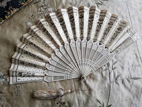 Antique sequin fan, brise sticks