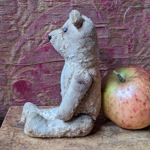 Small antique teddy bear, rod jointed