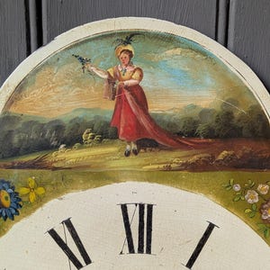 Antique clock face, long case clock, girl & flowers