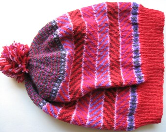 Fair Isle hand knitted slouchy beret with pompom.  Ribbed edge fits most heads.