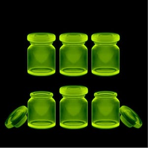 Collectible Uranium Glass Bottles With Lids Apothecary Jars Trinket Bottles ( 6 pieces )