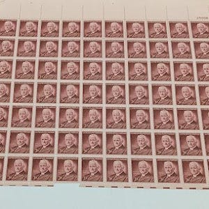 1960 年発行の 3 セント USPS 切手シート。合計 70 枚: イーストマン、コダック、ジョージ・イーストマン。