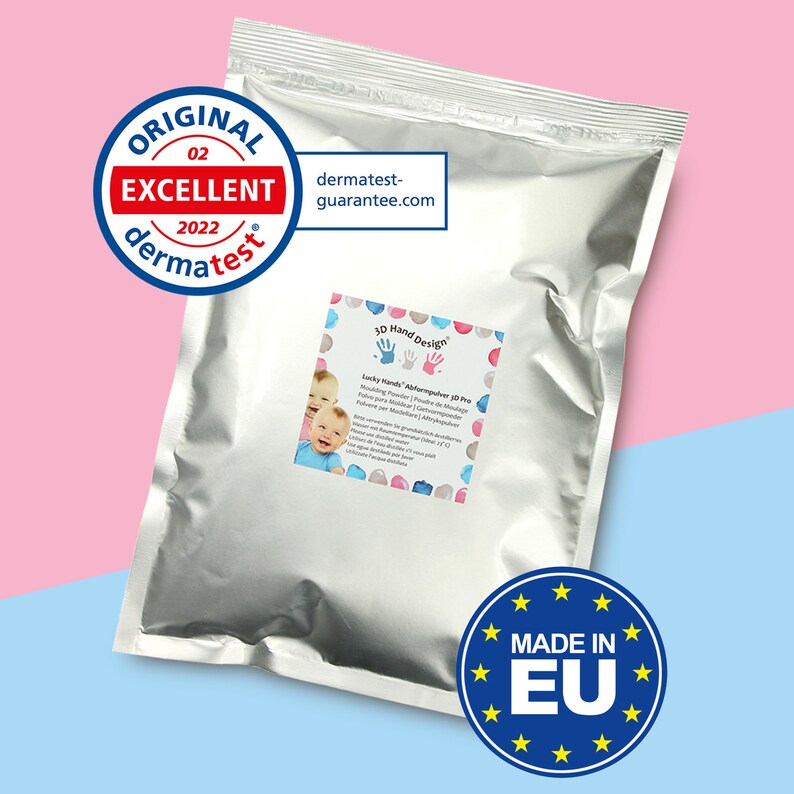 May include: A silver pouch with a label that reads "3D Hand Design" and "Lucky Hands"  "Albermpulver 3D Pro"  "Modellier Pulver | Poudre de Modeler | Polvere per Modellare | Modelleerpoeder"  "For making 3D hand and footprints". The pouch has a seal that reads "ORIGINAL 02 EXCELLENT 2022 dermatest" and "dermatest-guarantee.com". The pouch also has a sticker that reads "MADE IN EU" with a circle of stars around it.