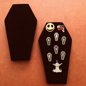 Coffin shaped pin display board, Disney Halloween villain pins universal horror nights