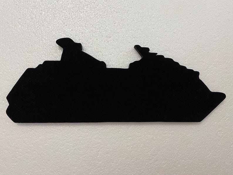 May include: Black silhouette of a cruise ship, a popular vacation destination for many.