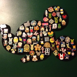 Large Disney pin board Mickey Mouse head profile pin display. Can hold 50 pin lots